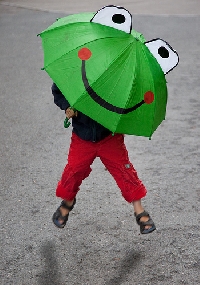 Kids love to stomp and splash in fun rain gear