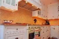 Kitchen under cabinet lighting is dramatic, functional and effective