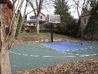Play backyard basketball best on a driveway court or new basketball court