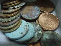 How do you clean coins? If it's not done right, it can cause severe damage
