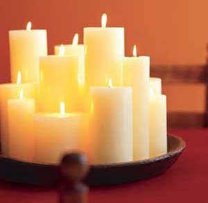 Using different candles for different spaces is an affordable way to decorate