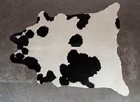 Find some creative ways to decorate with cowhide for a Southwestern look