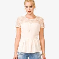 Learn what to wear under a sheer lace top to make a fashion statement