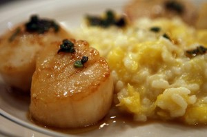 Sear scallops in truffle oil for an extravagant recipe