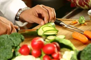 wok tips man cutting vegetables