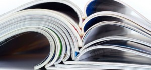 stack of open magazines