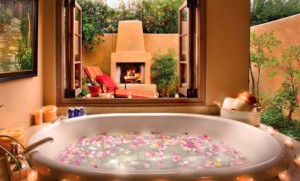 luxurious bath tub with rose petals