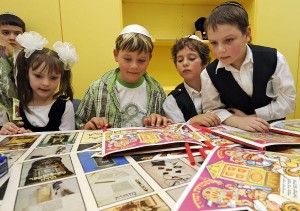 Jewish kids with art from top 10 Jewish kids celebrations
