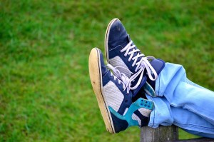 feet up in sneakers