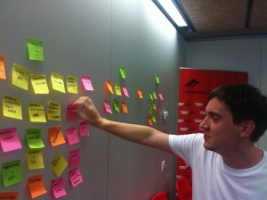 man with sticky notes on board