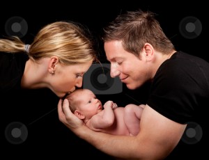 couple with newborn baby