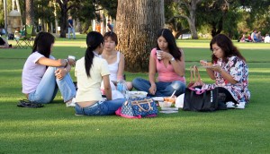 women sitting in park