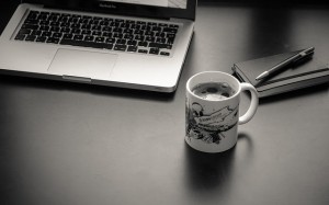 coffee cup and computer