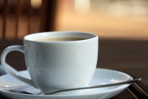 white cup and saucer