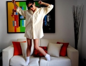 woman dancing on couch