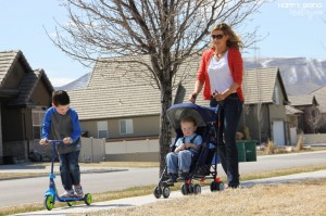 woman walking with kids