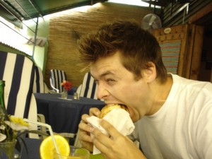 Man eating big sandwich