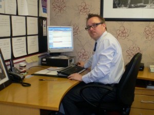 man with computer in office