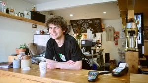 smiling man at coffee house