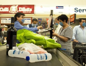 people in store wearing masks