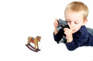 child with camera