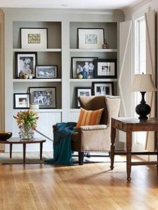 framed photos on shelf