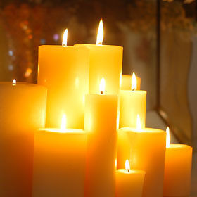 Lit group of beeswax candles