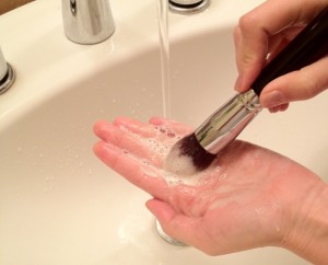 washing makeup brush