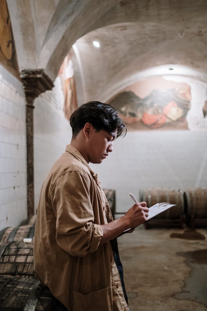 Man checking on winery