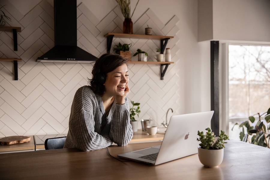 Woman sitting in the kitchen